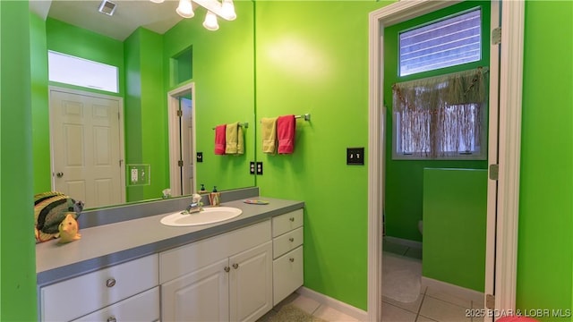 bathroom featuring vanity and tile patterned flooring