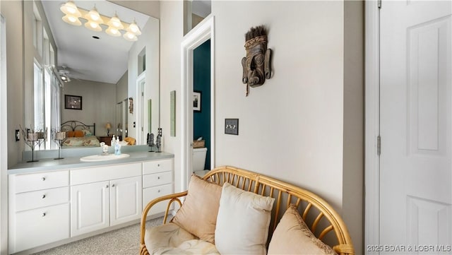 bathroom featuring vanity and ceiling fan