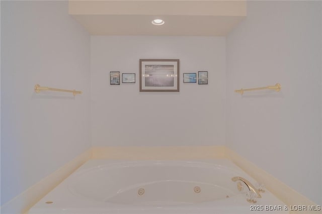 bathroom with a tub