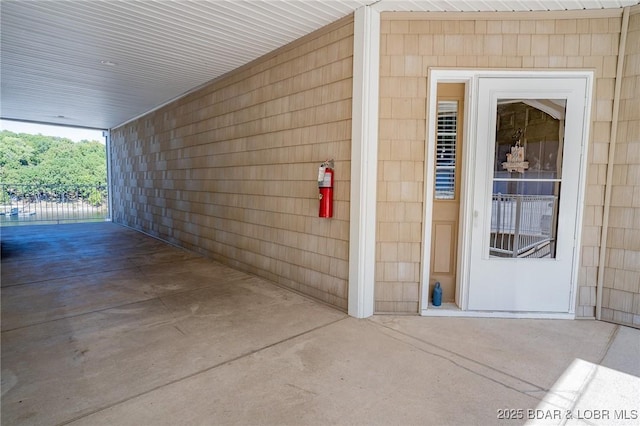 entrance to property with a patio