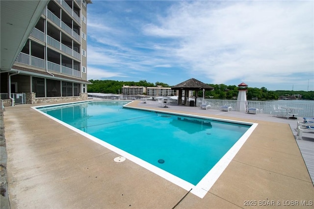 view of pool featuring a gazebo and a patio