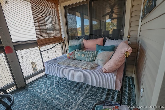 balcony featuring ceiling fan