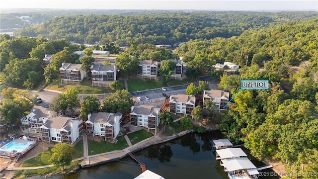 birds eye view of property featuring a water view