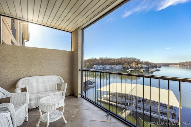 balcony featuring a water view