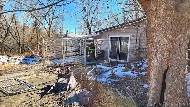 view of snow covered property