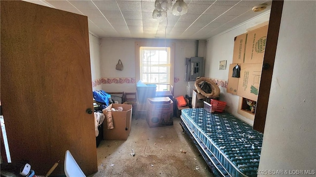 bedroom featuring electric panel