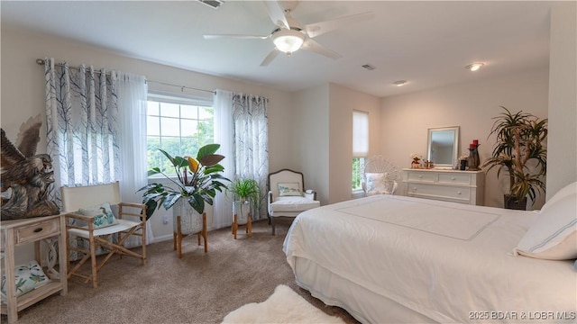 carpeted bedroom with ceiling fan