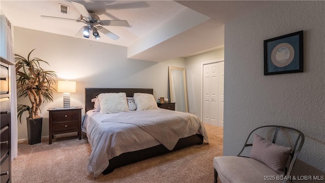 carpeted bedroom featuring ceiling fan