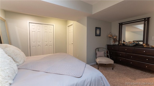 carpeted bedroom with a closet