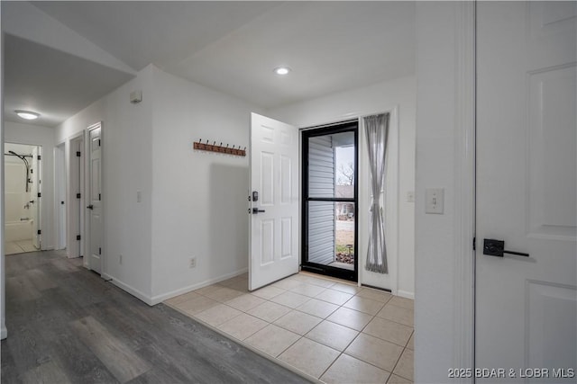 foyer with light hardwood / wood-style flooring