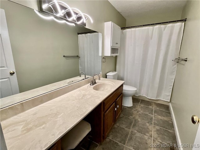 bathroom featuring vanity, a shower with shower curtain, a textured ceiling, and toilet