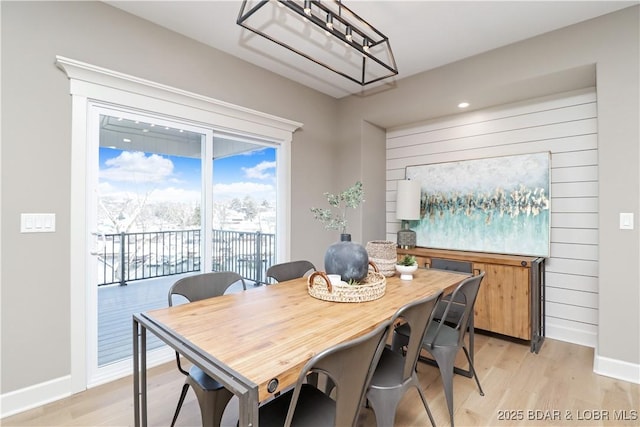 dining space featuring light hardwood / wood-style floors