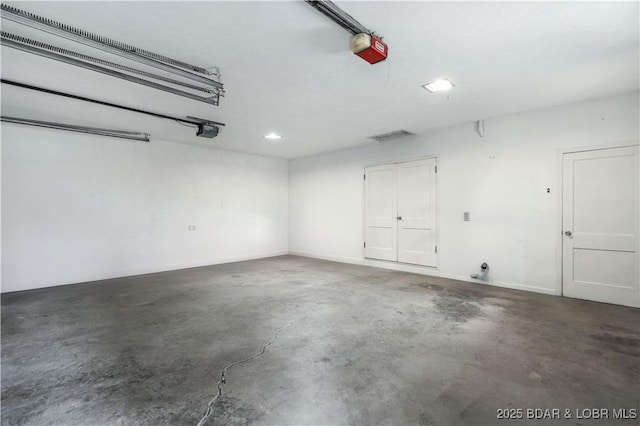 garage featuring a garage door opener