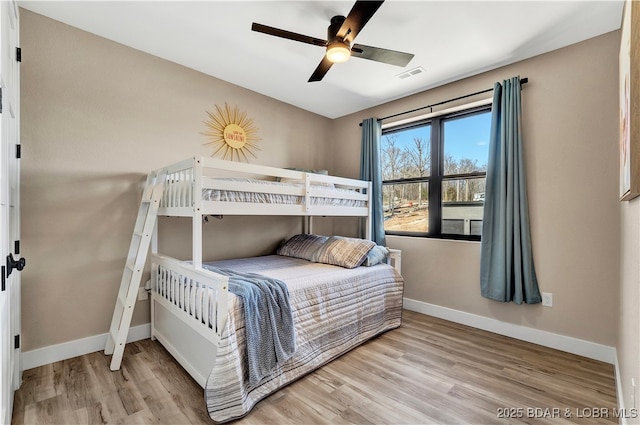 bedroom featuring ceiling fan and light wood-type flooring