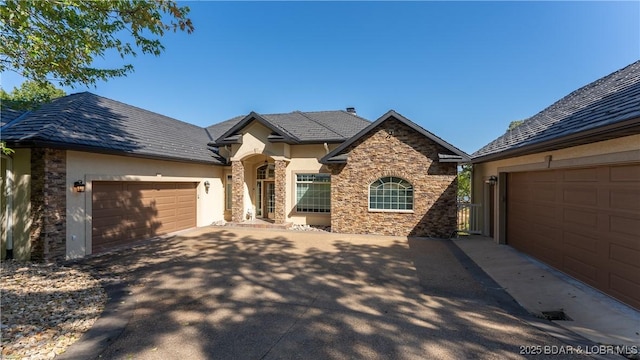 view of front of property with a garage