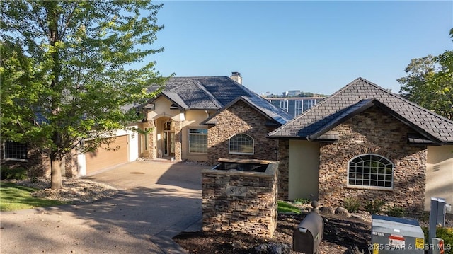 view of front of home with a garage