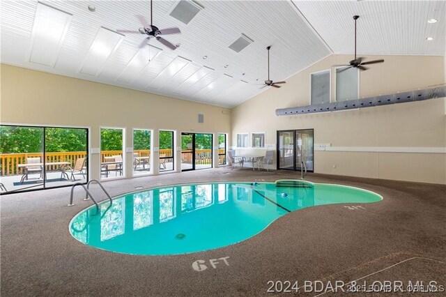 view of swimming pool with ceiling fan