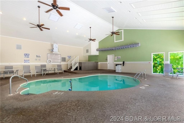 view of swimming pool with a skylight