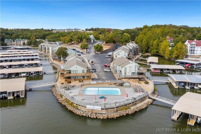 drone / aerial view with a water view