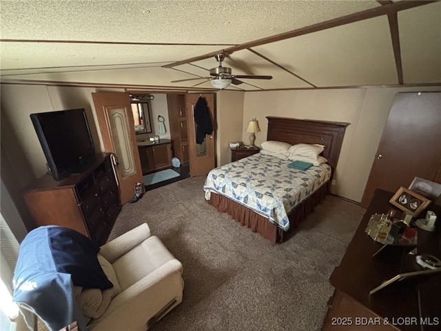 carpeted bedroom with lofted ceiling and a textured ceiling