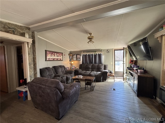 living room featuring lofted ceiling with beams, ornamental molding, and dark hardwood / wood-style floors