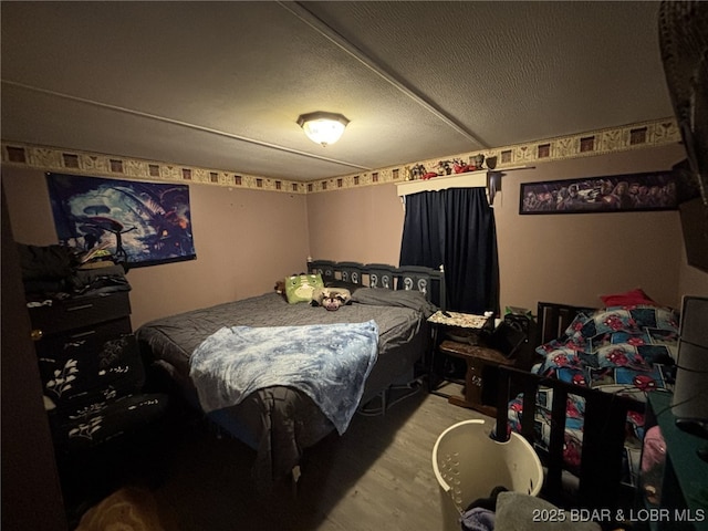 bedroom featuring a textured ceiling