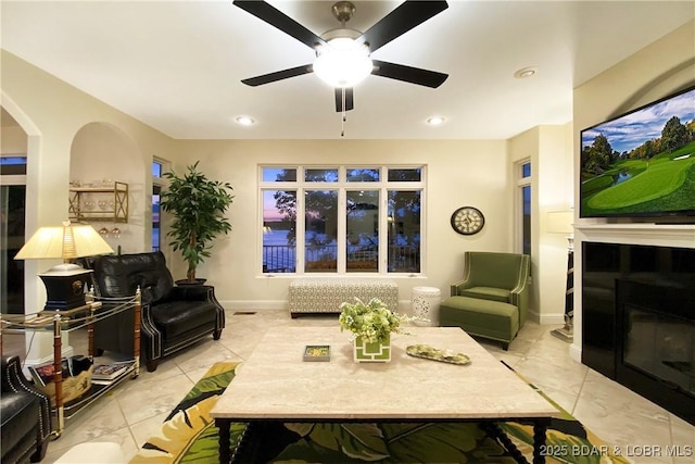 living room featuring ceiling fan