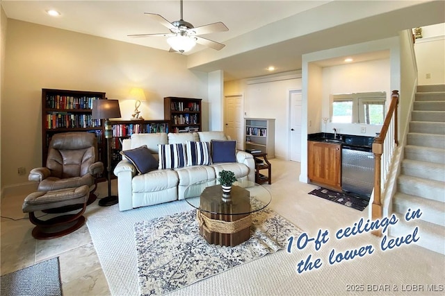 living room with sink and ceiling fan