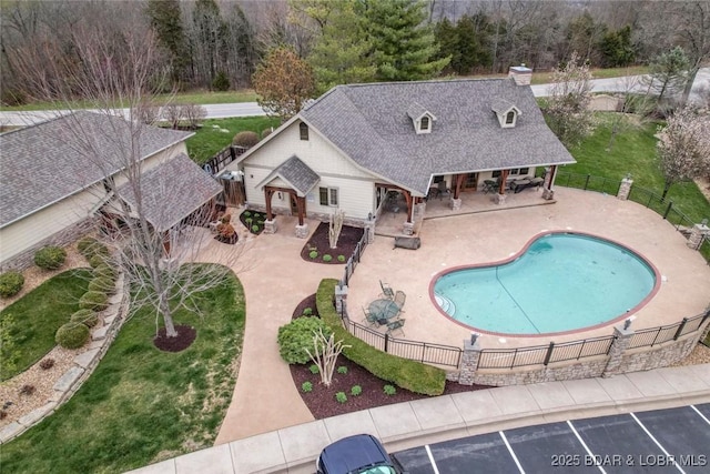 view of swimming pool with a patio area