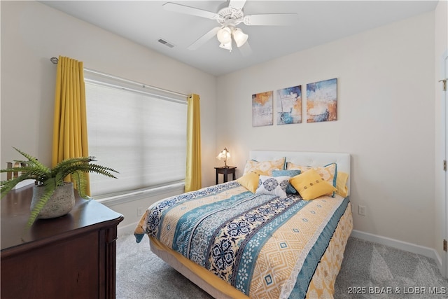 carpeted bedroom featuring ceiling fan