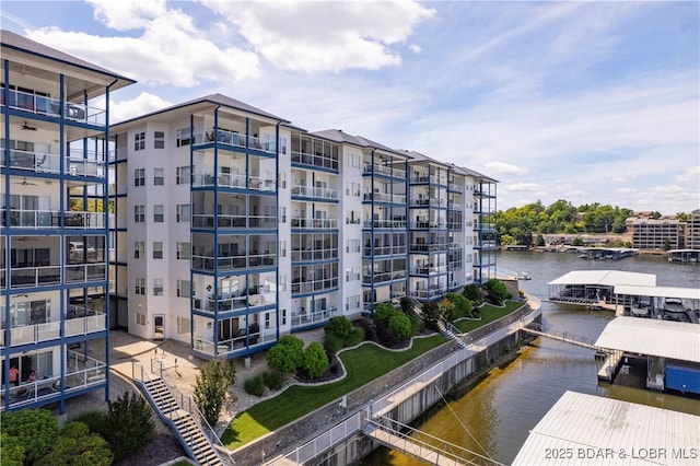 view of building exterior featuring a water view