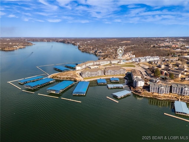 birds eye view of property featuring a water view