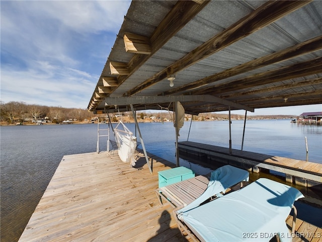 view of dock with a water view