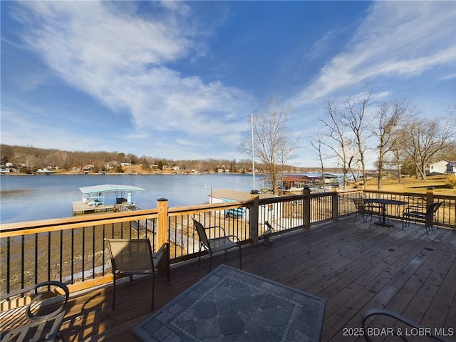 wooden deck with a water view