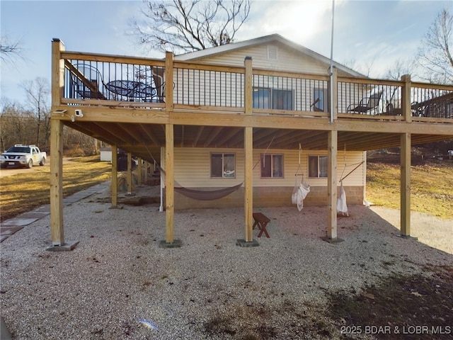 rear view of property with a deck