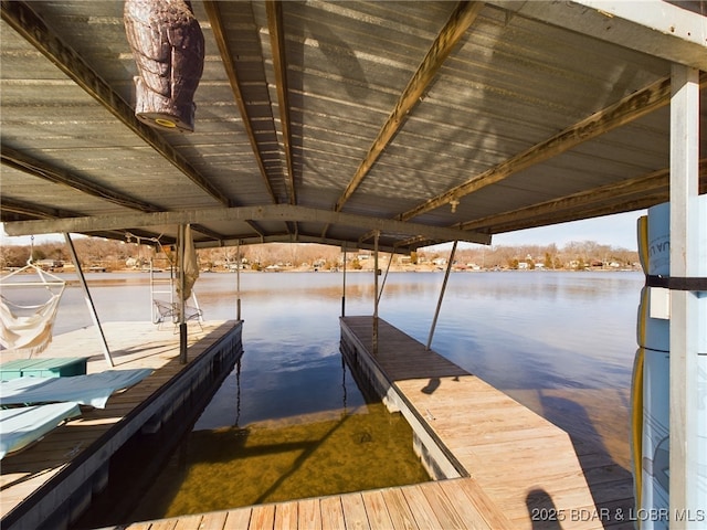 view of dock with a water view