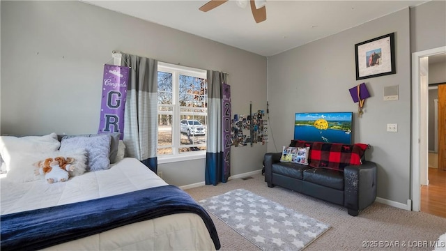 carpeted bedroom with ceiling fan