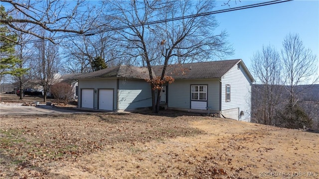 ranch-style home with a garage