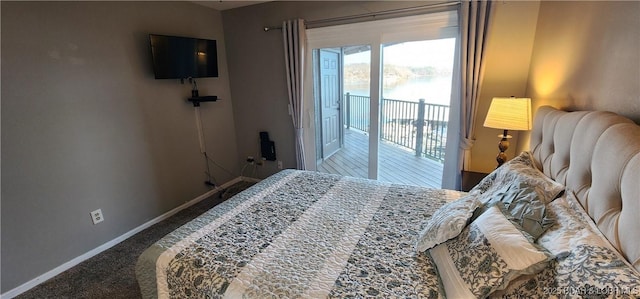 bedroom with carpet flooring and access to outside