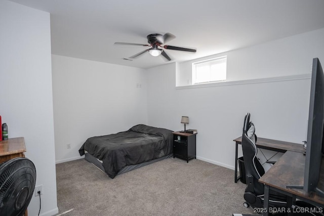 bedroom with ceiling fan and light colored carpet