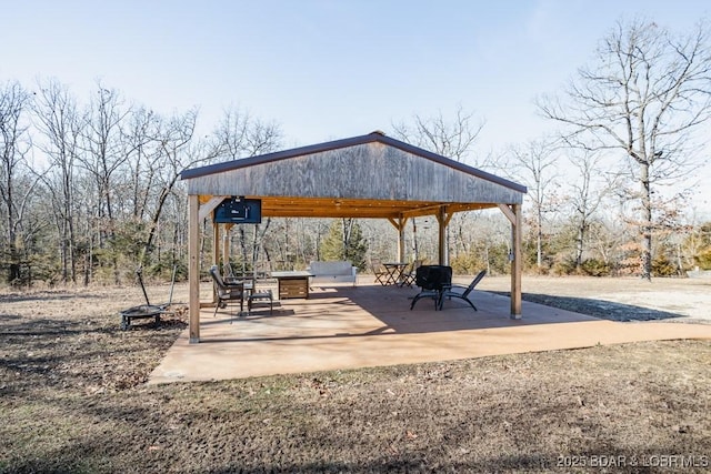 surrounding community featuring a gazebo and a patio area