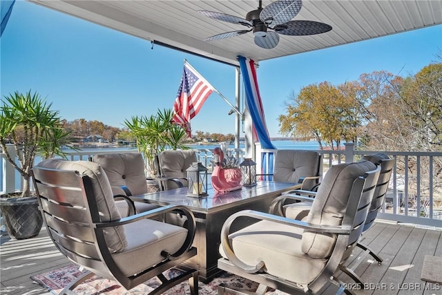 wooden deck featuring ceiling fan