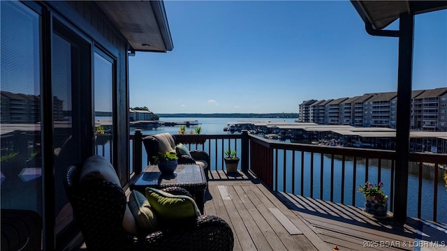 balcony featuring a water view