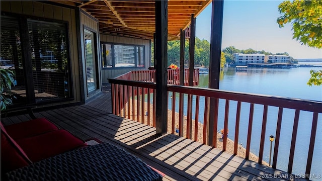 deck featuring a water view