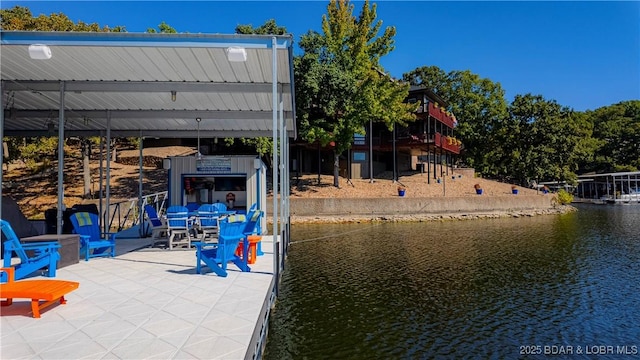 dock area with a water view