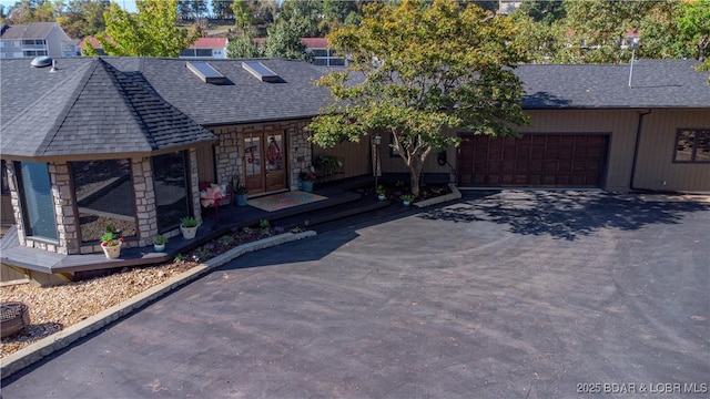 view of front of property featuring a garage