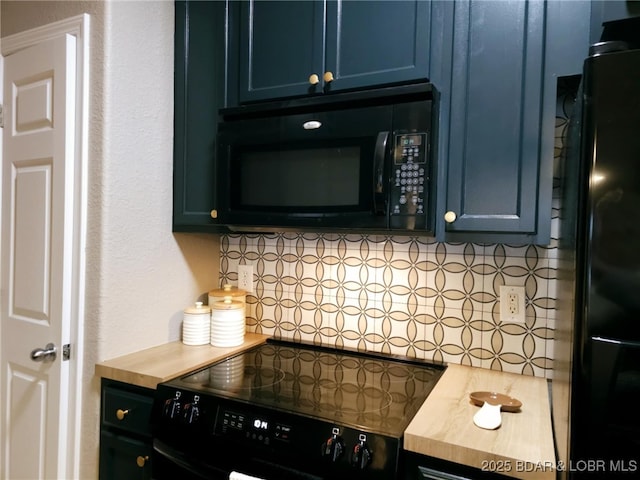 kitchen with backsplash, blue cabinetry, butcher block counters, and black appliances