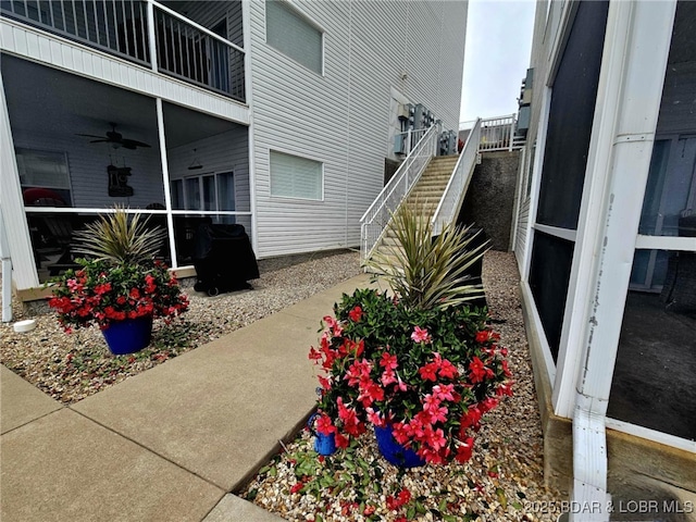 view of patio featuring ceiling fan