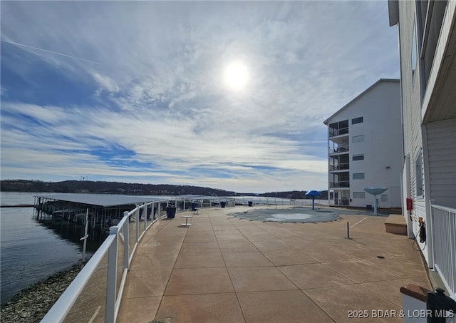 exterior space with a water view