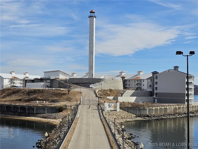 view of home's community featuring a water view